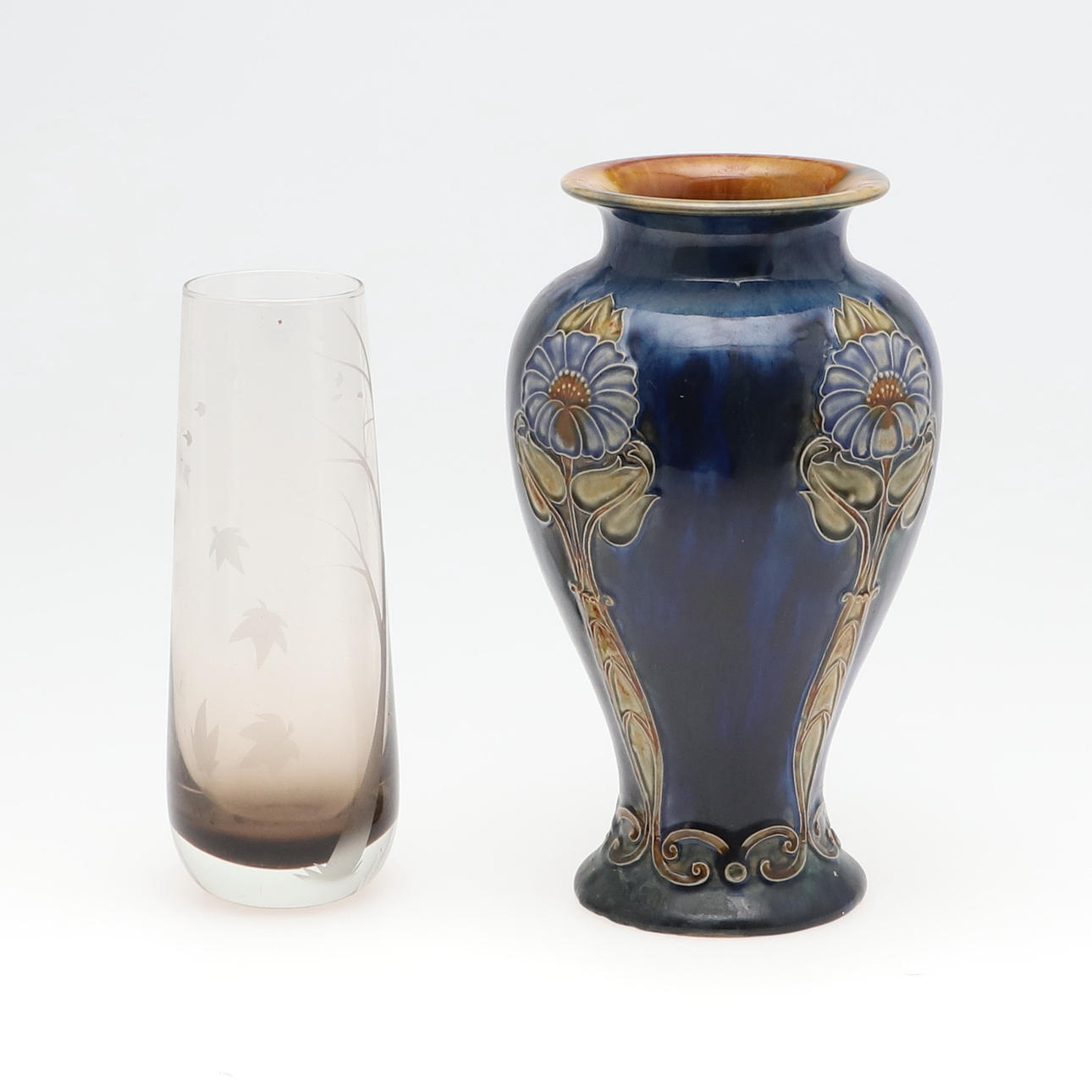 A ROYAL DOULTON STONEWARE VASE.