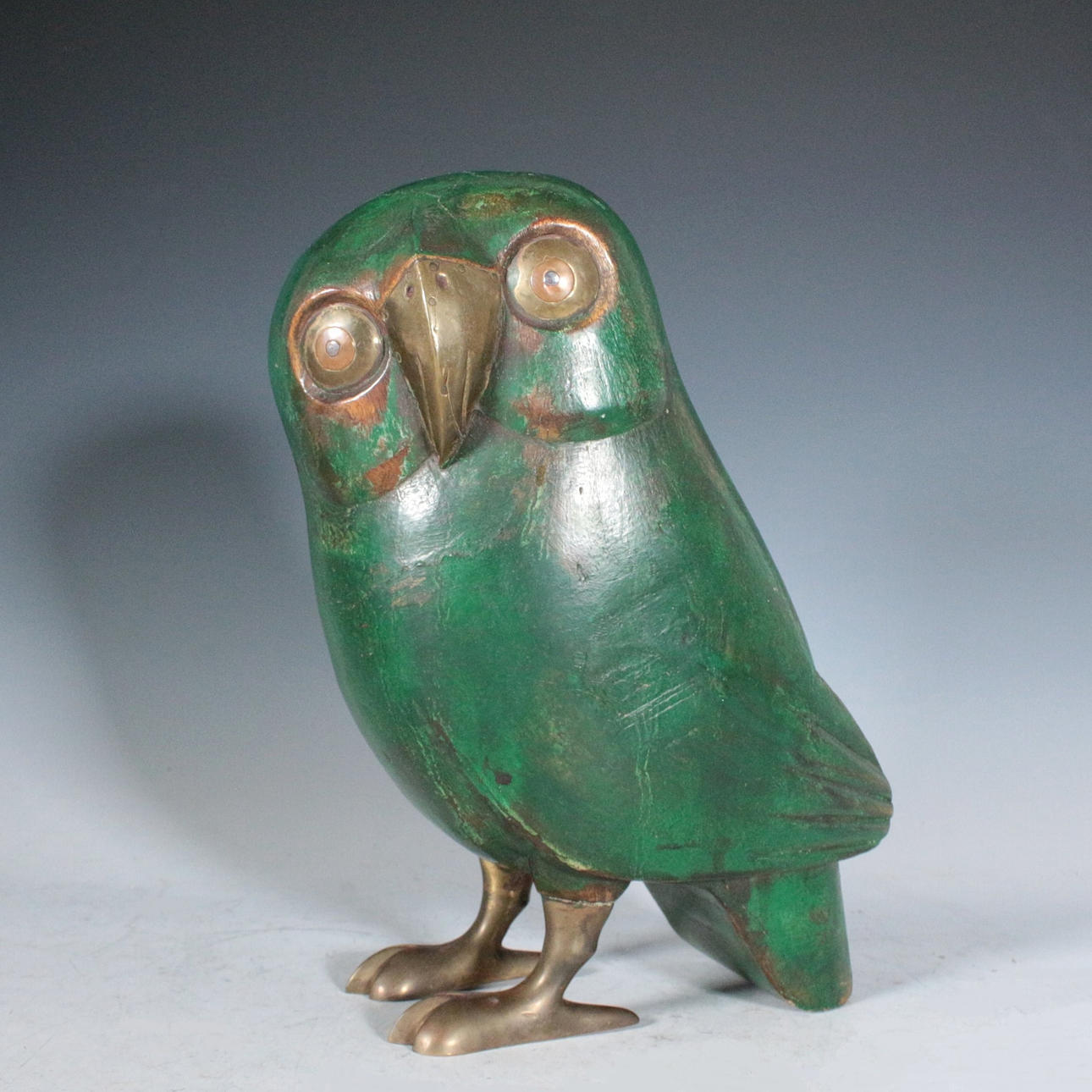 SERGIO BUSTAMANTE. attributed. 'Owl', wood, brass.