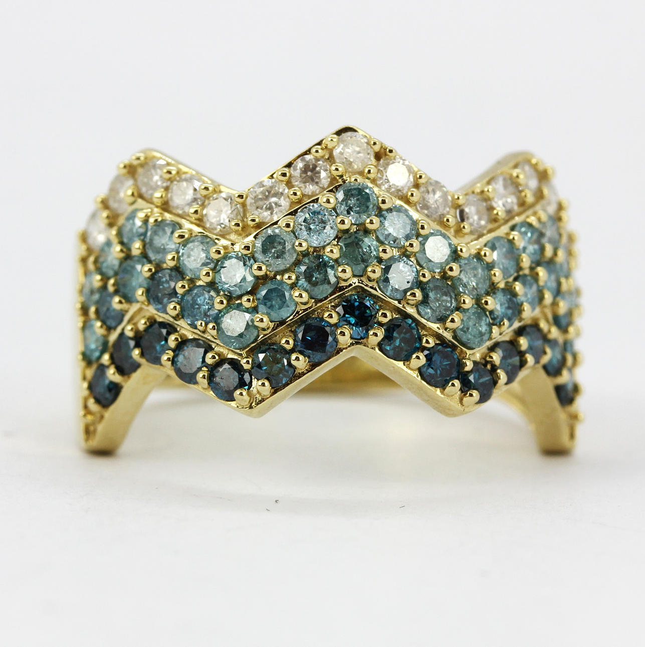 ANILLO ONDA DIAMANTE AZUL.