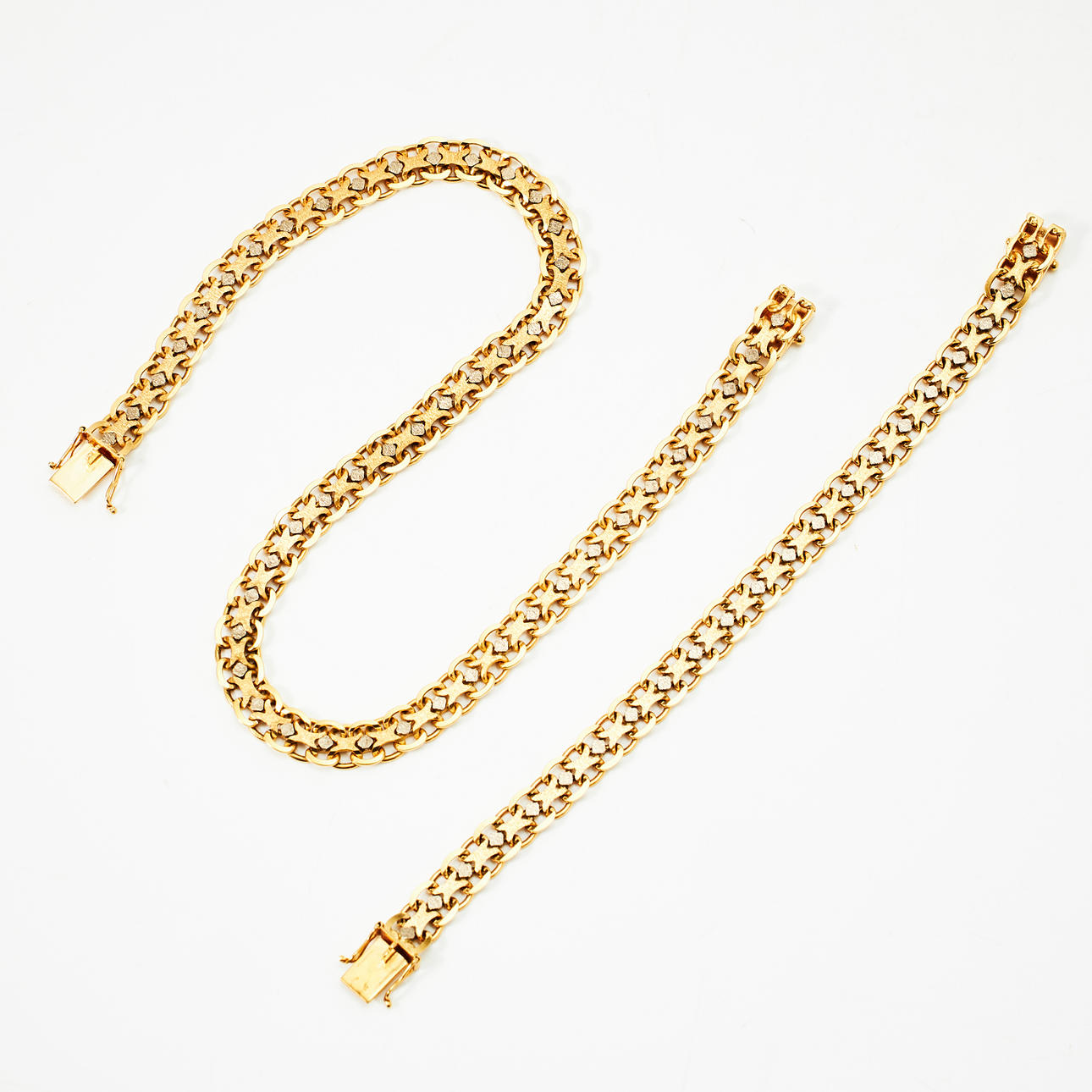 COLLIER, ARMBAND, 18 k röd- samt vitguld, modifierade x-länkar.
