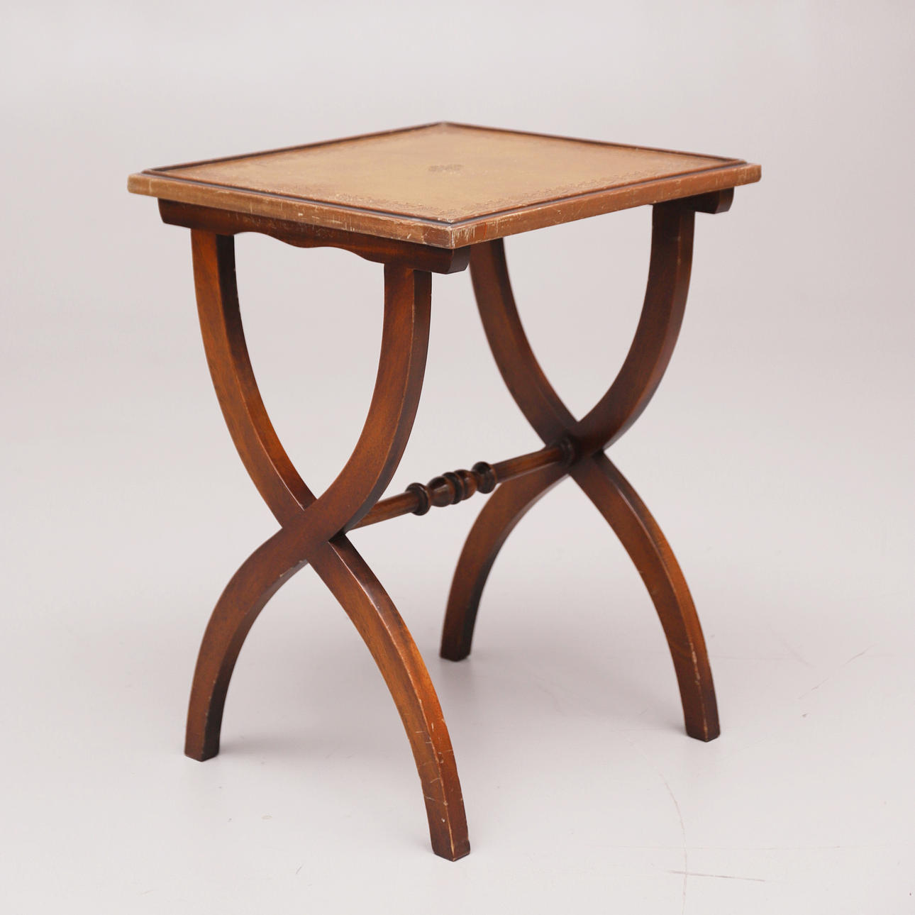 ENGLISH STYLE SIDE TABLE WITH RUSSIAN LEATHER TOP.