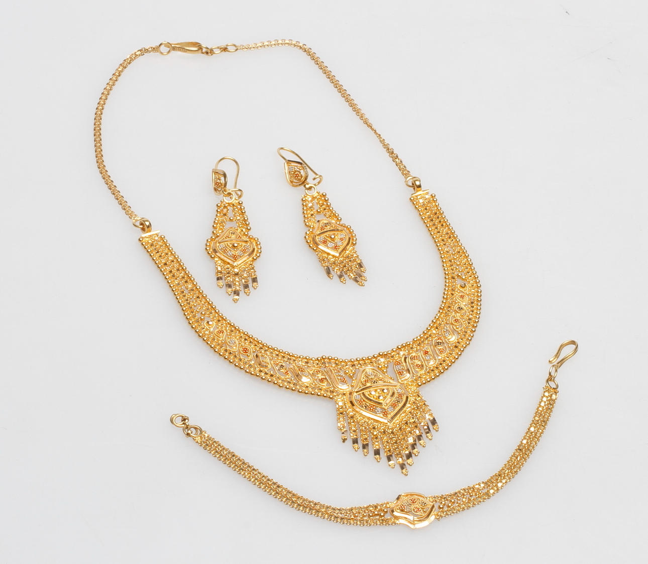 SMYCKESET, 21k guld, vikt ca 49,7 gr.