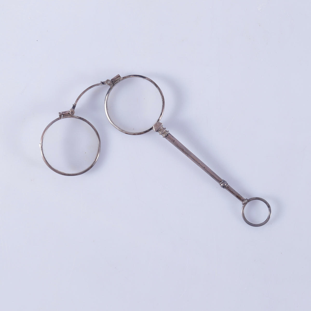 LORGNETTE, silver, 19th century.