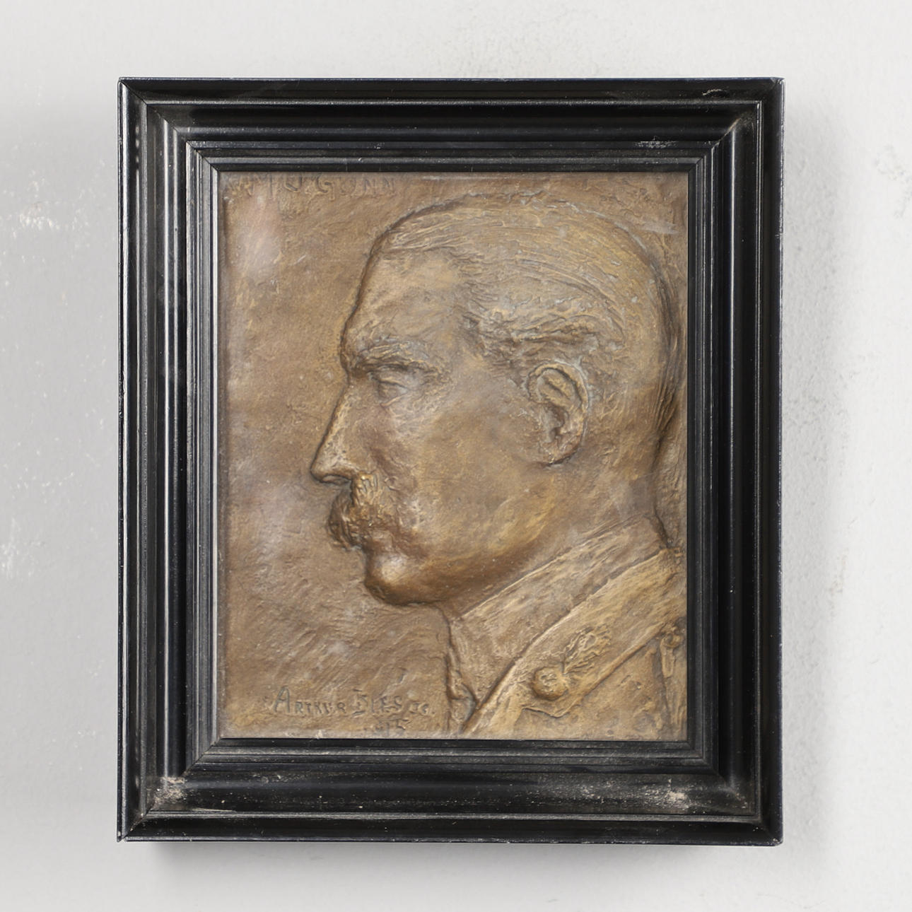 FRAMED BRONZE SIGNED PLAQUE.