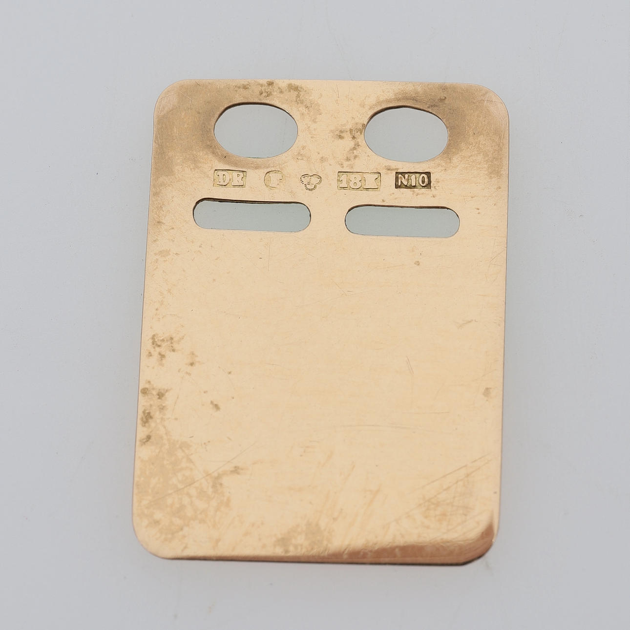 IDENTITETSBRICKA, 18K guld.