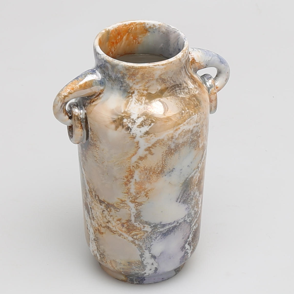 VAS i porslin, "lystermarmor", jugend, Arabia.