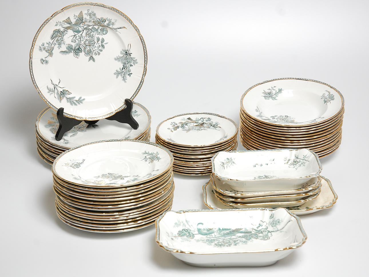 MATSERVIS, 60 delar, Wexiö guld , Gustavsberg, stämplad 1921.