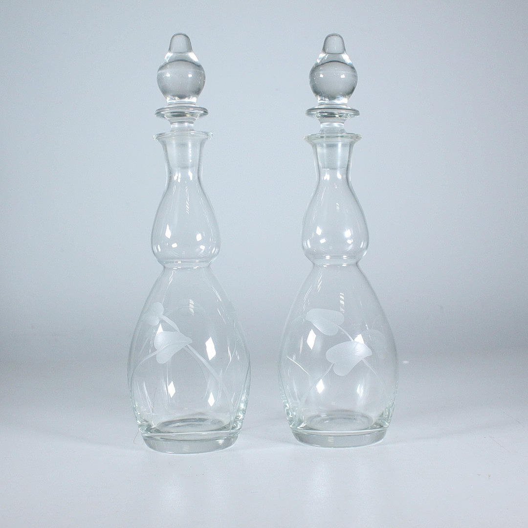 Fyra glasflaskor. Glas - Bruksglas - Auctionet