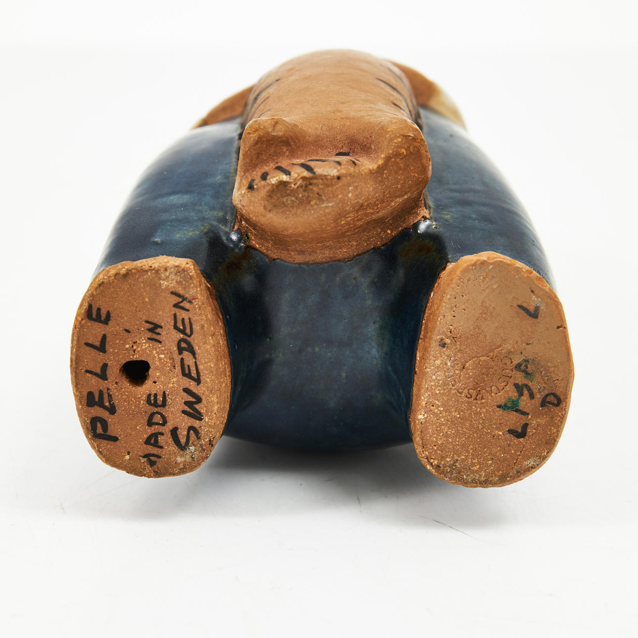 LISA LARSON. The figurine, 