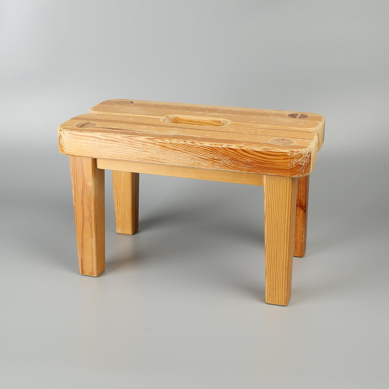 Stool, pine, junior model, marked "Stockholms stads arbetsvårdsbyrå", 1970s.