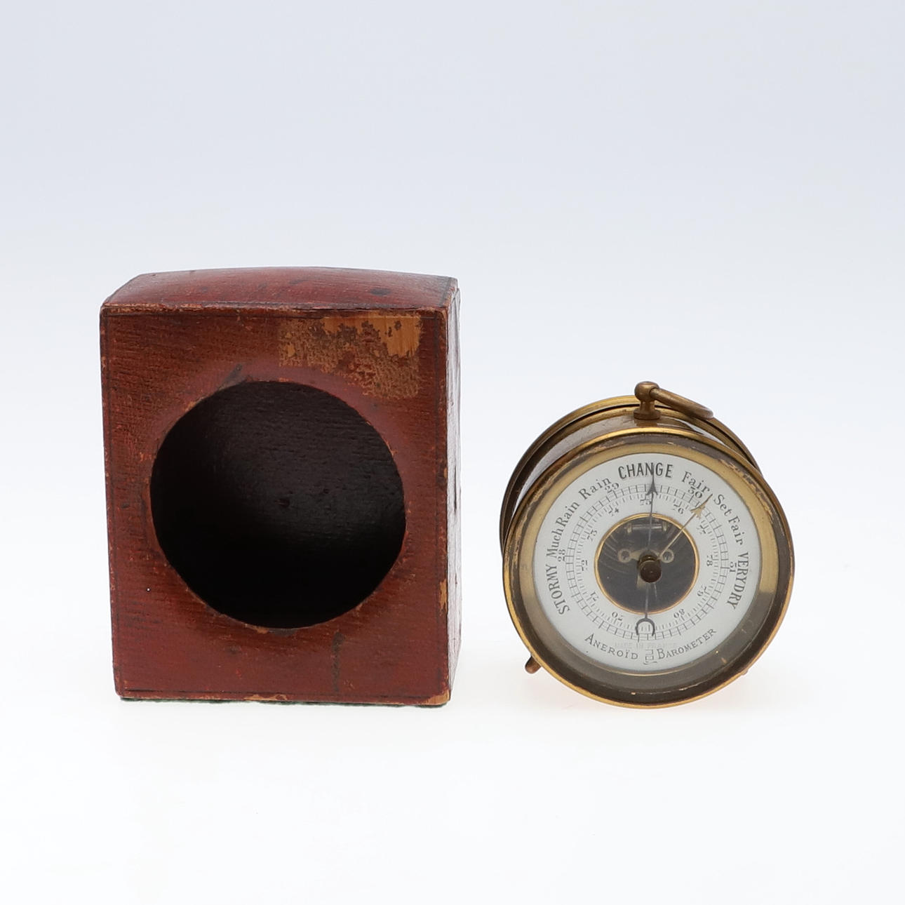 A FRENCH ANEROID CASED BAROMETER.