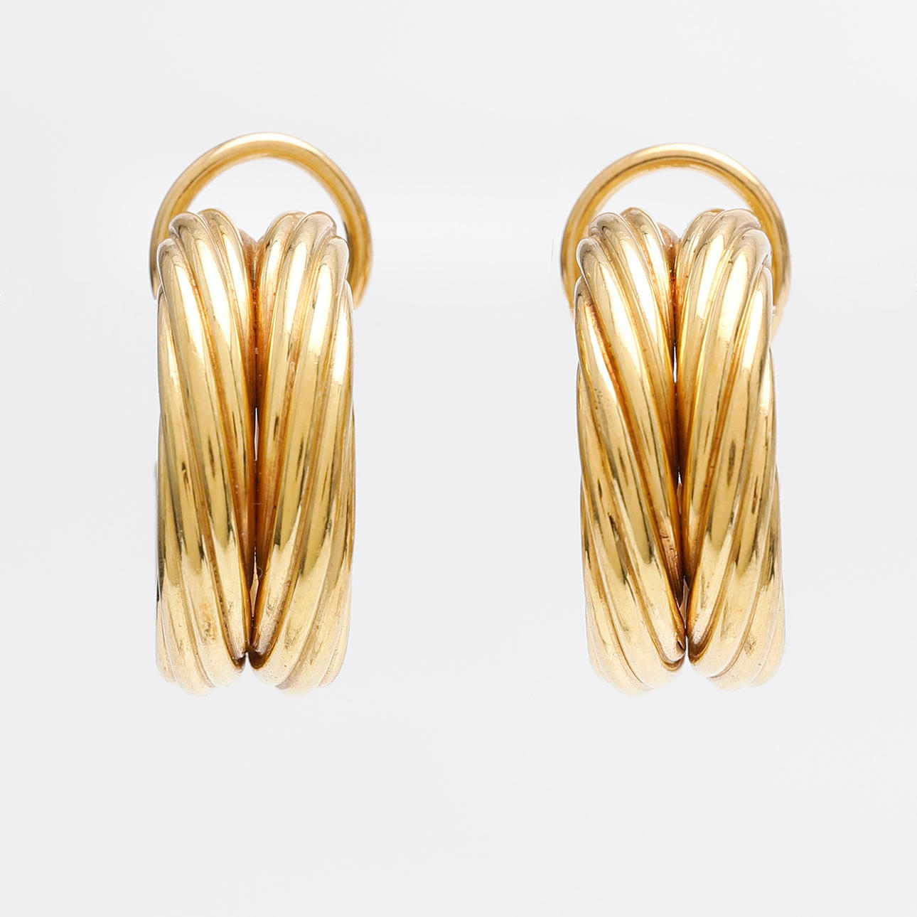 SOLER CABOT. Gold creole earrings.