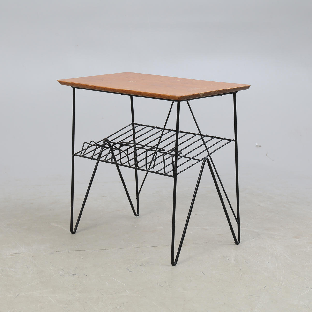 NEWSPAPER TABLE, thong, mid 20th century.