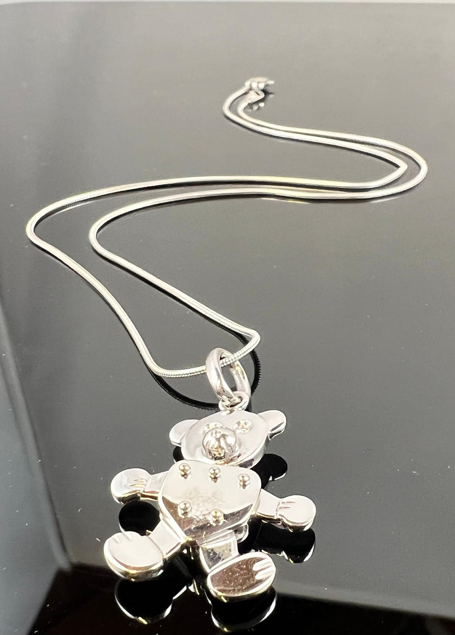 "Teddy" kaulakoru valkokulta ja platina.