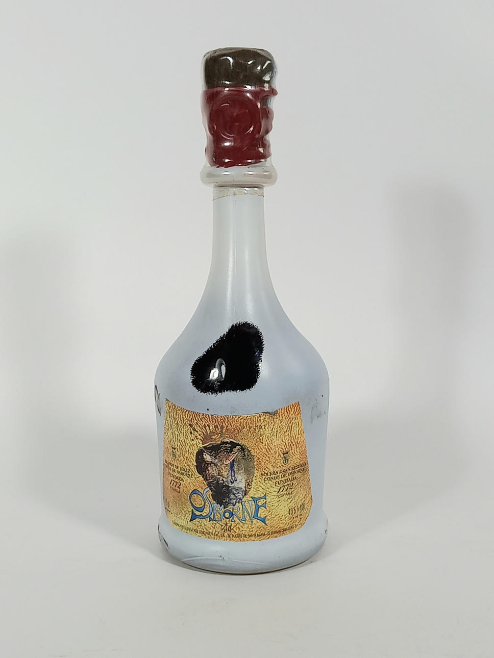 DALÍ. BOTELLA BRANDY DE JEREZ OSBORNE.