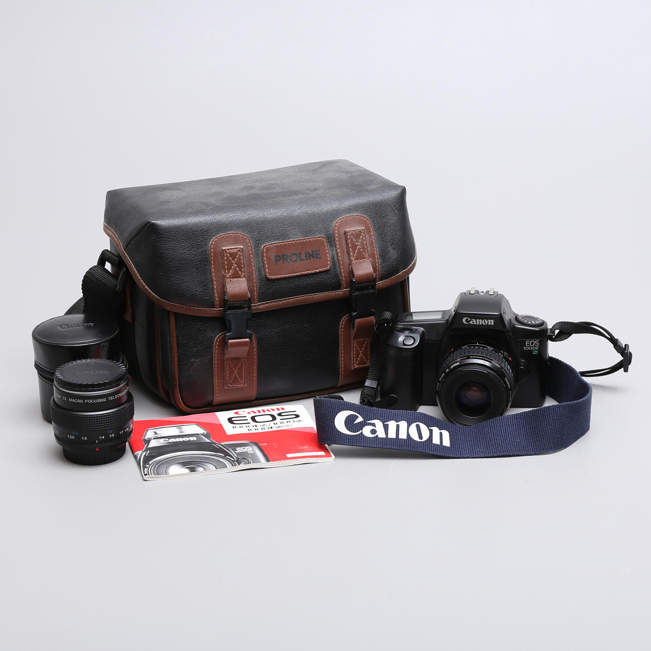 CANON EOS 1000F, analog system camera, in bag, 1990s.