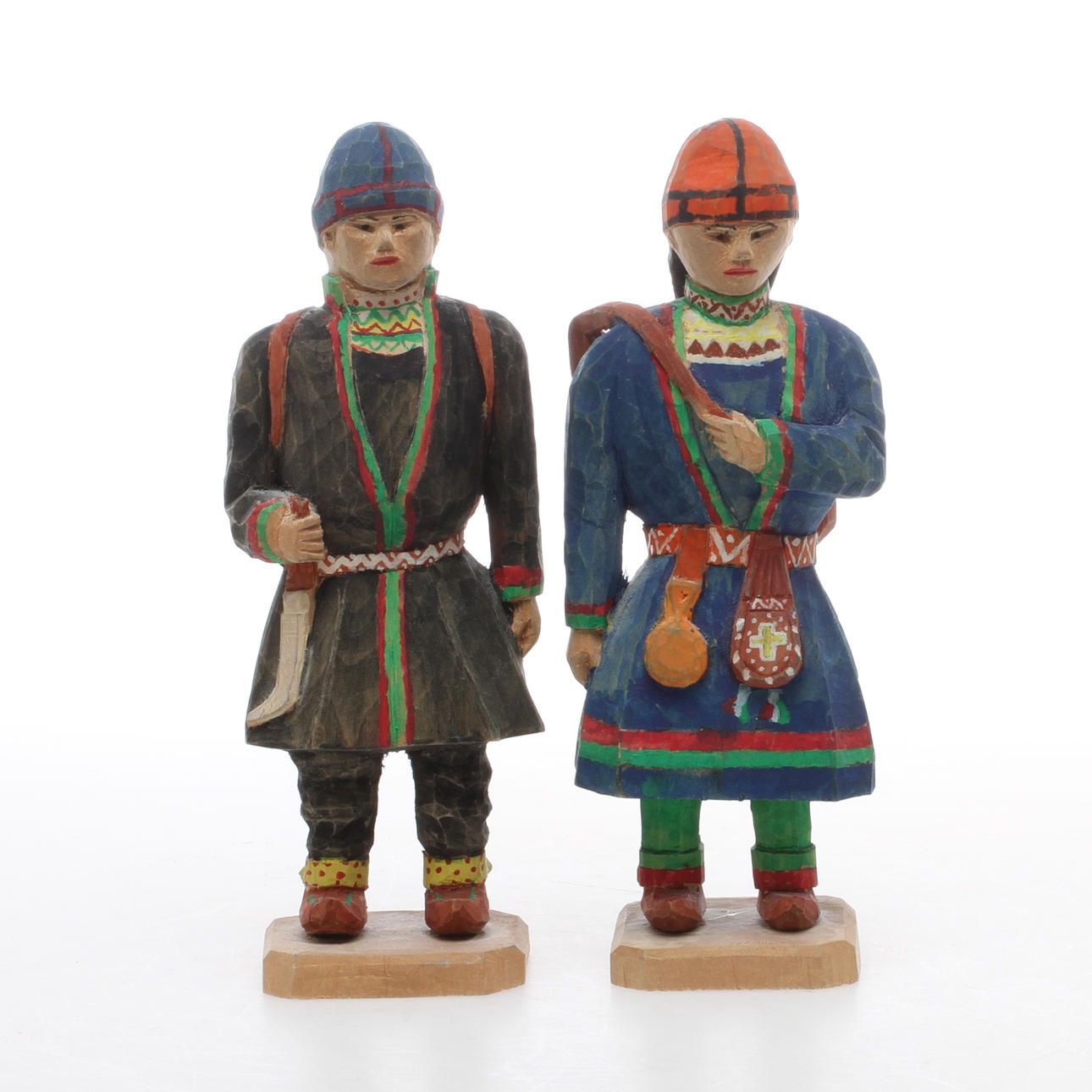 FIGURINER, 2 st, Samer, skuret och bemålat trä, singerad A.M 1969.