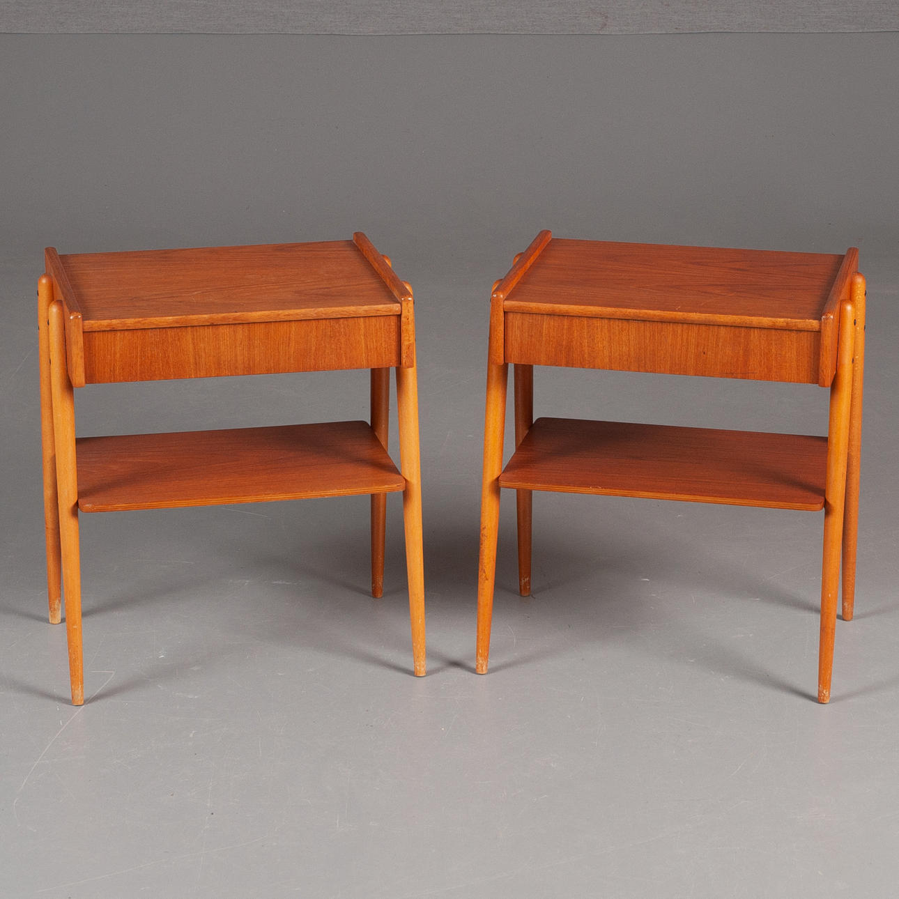 BEDSIDE TABLE. A pair, teak and oak, Sweden, 1950s.