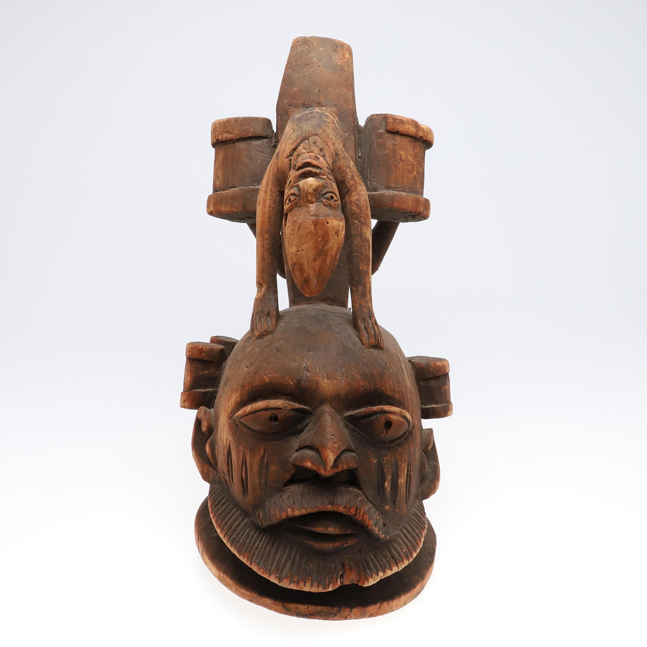 A TRIBAL STYLE MASK.
