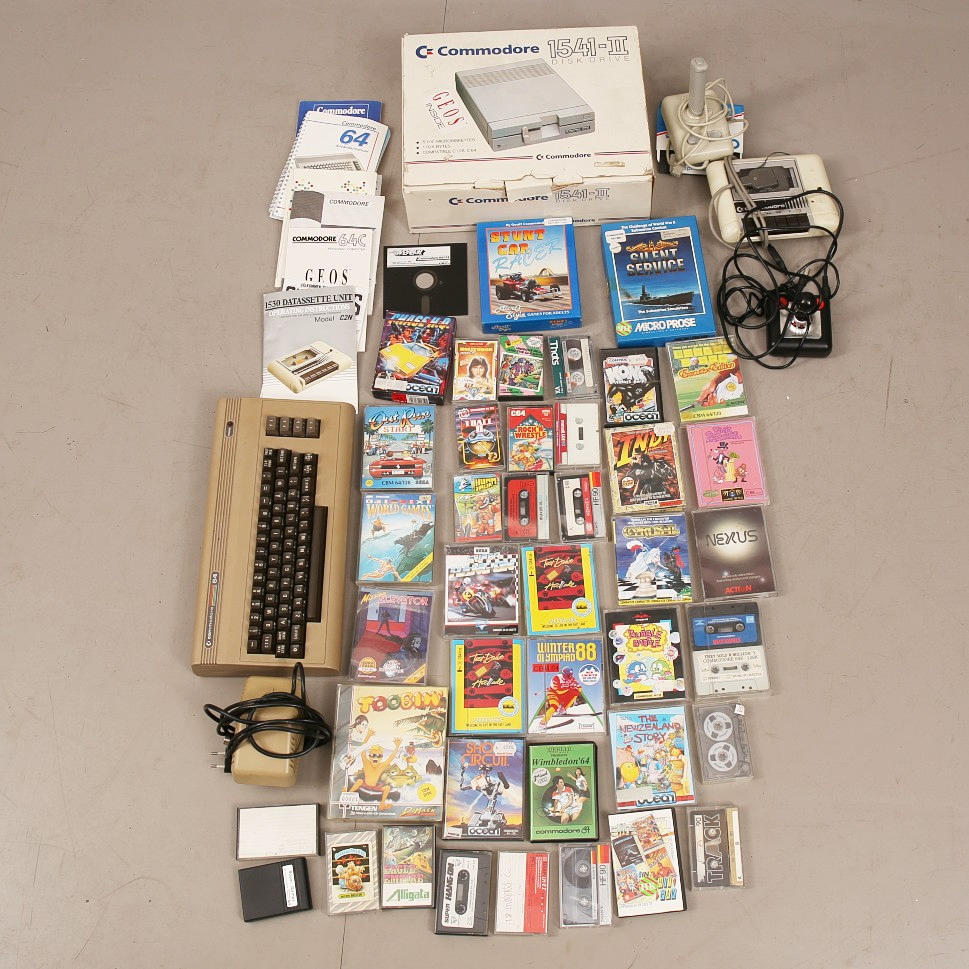 COMMODORE 64, original, first model, 1985 with 41 original cassette-based games + 2 disc drive games.