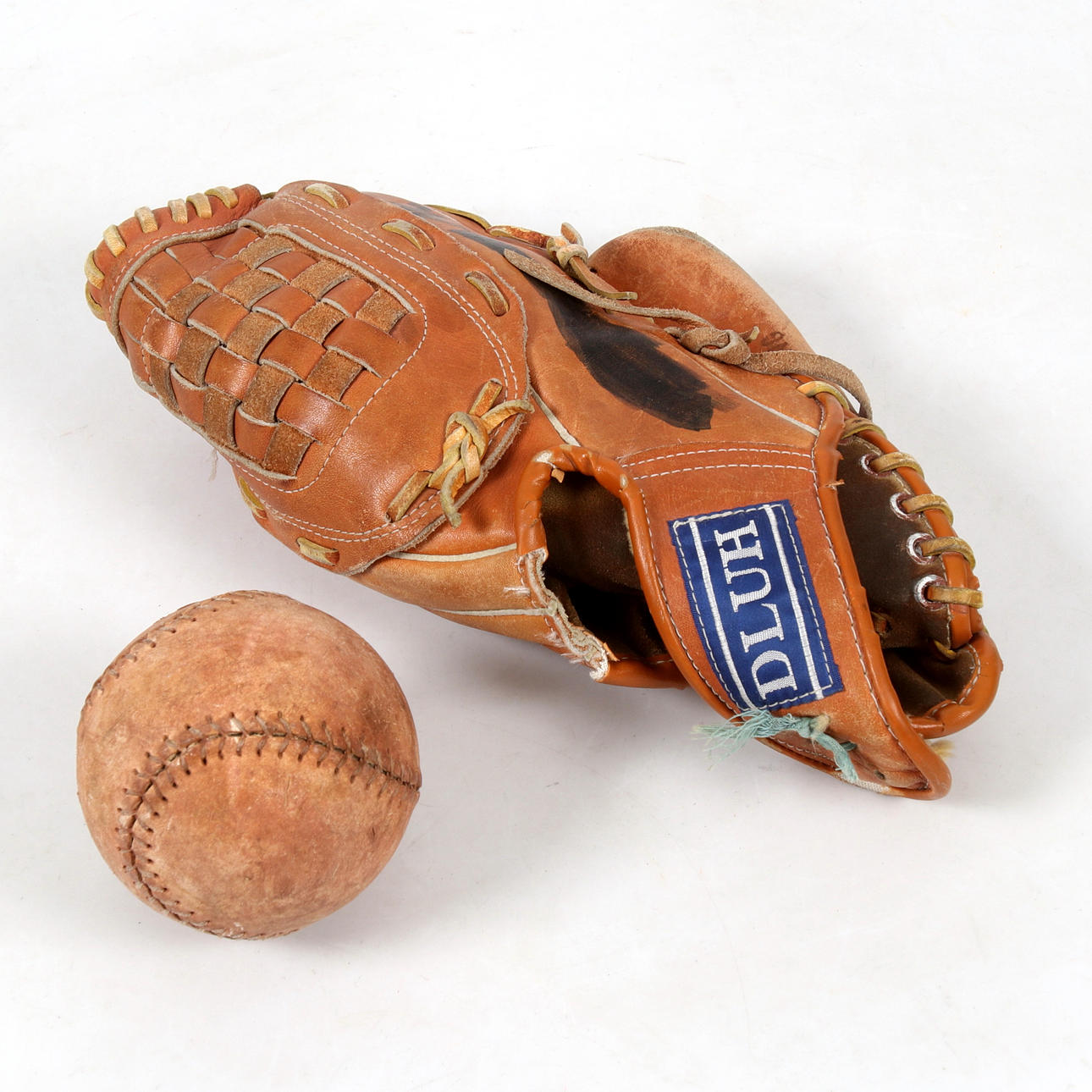 BASEBALL GLOVE and BALL, leather, Dluh, 1900s.