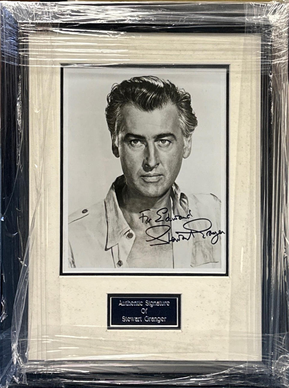 STEWART GRANGER SIGNED PHOTOGRAPH.