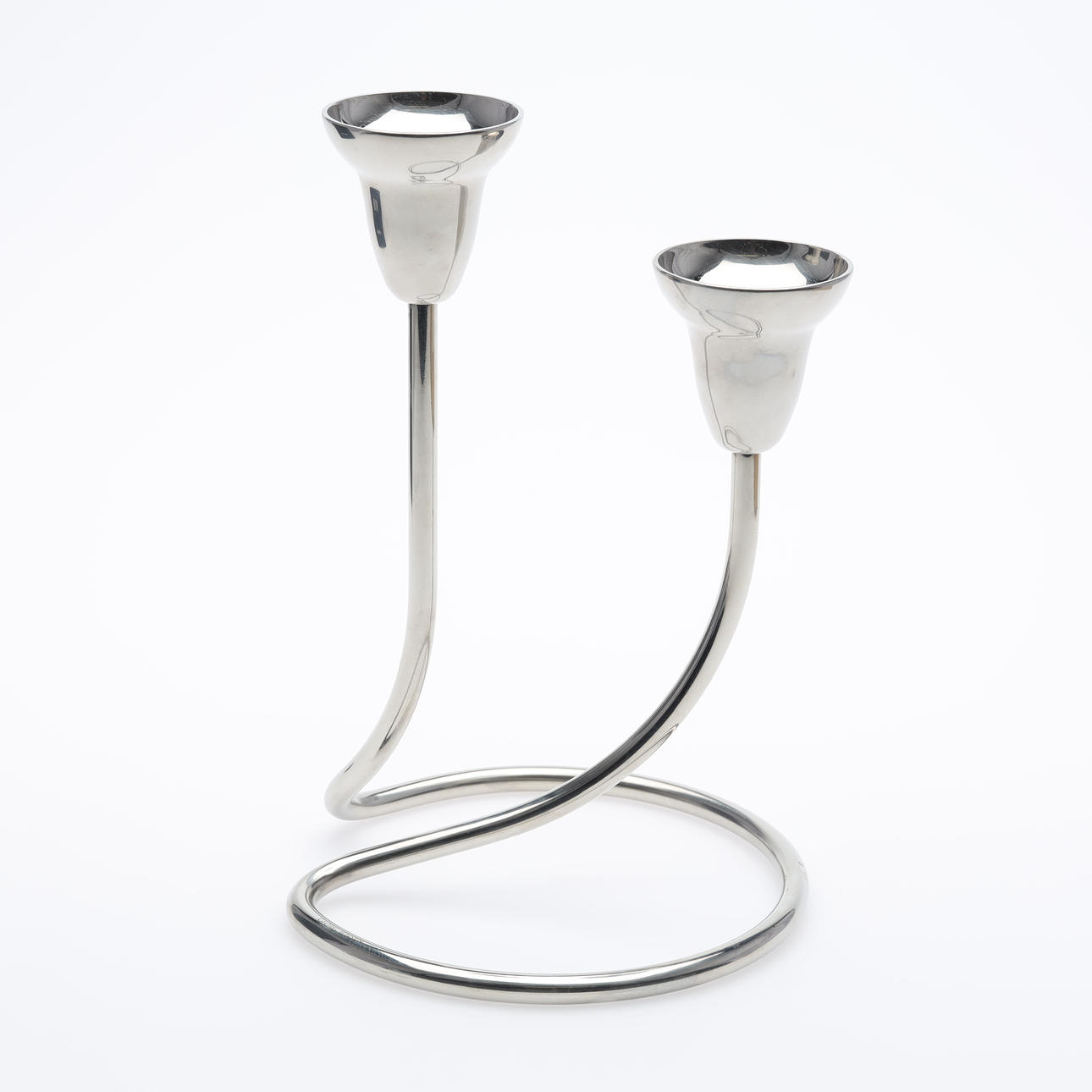 GEORGE JENSEN. "Swing", lysestage, rustfrit stål.