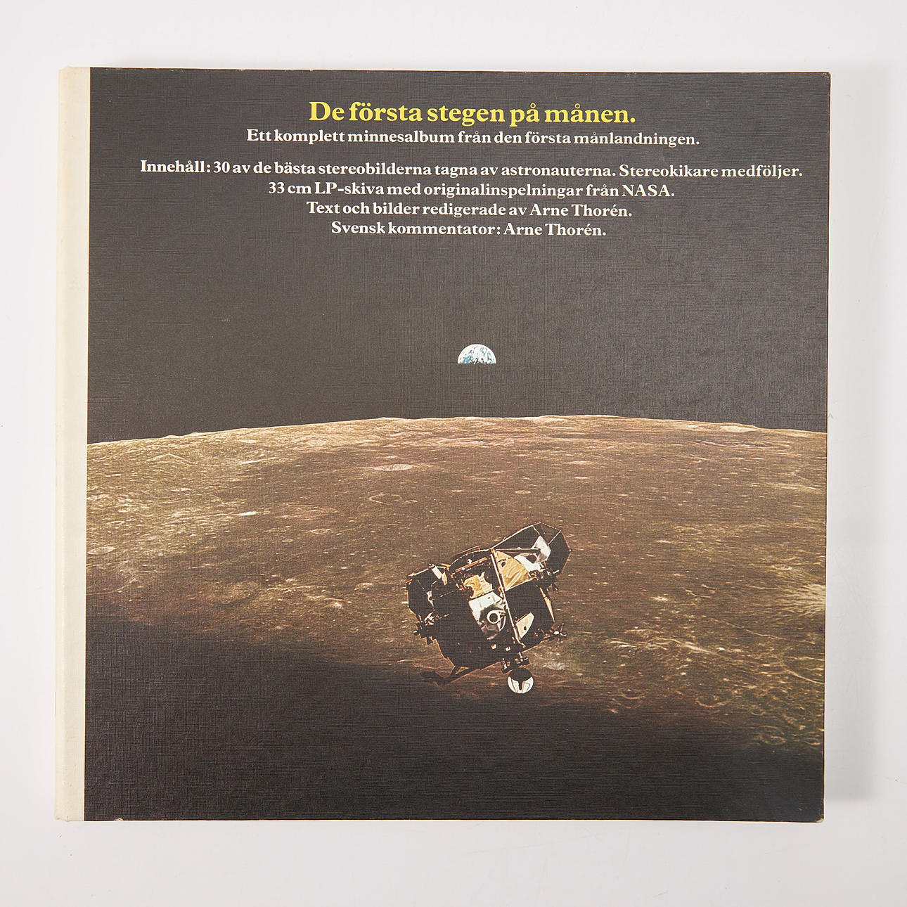 THE FIRST STEPS ON THE MOON A complete commemorative album from the first moon landing. 1969.