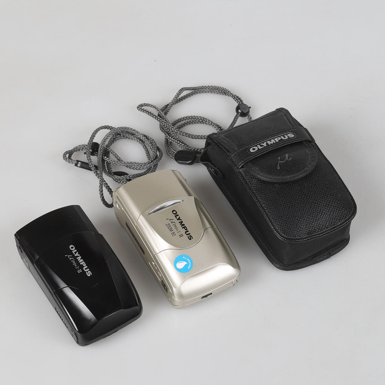 KOMPAKTKAMERAS, 3 Olympus, ca. 2000, Japan.