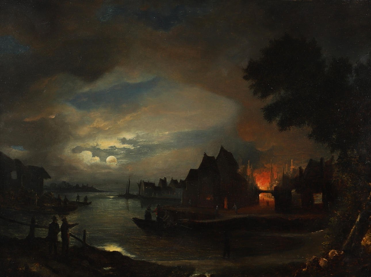 FOLLOWER OF AERT VAN DER NEER (1603-1677). MOONLIT TOWN SCENE BY A RIVER, A FIRE IN THE DISTANCE.