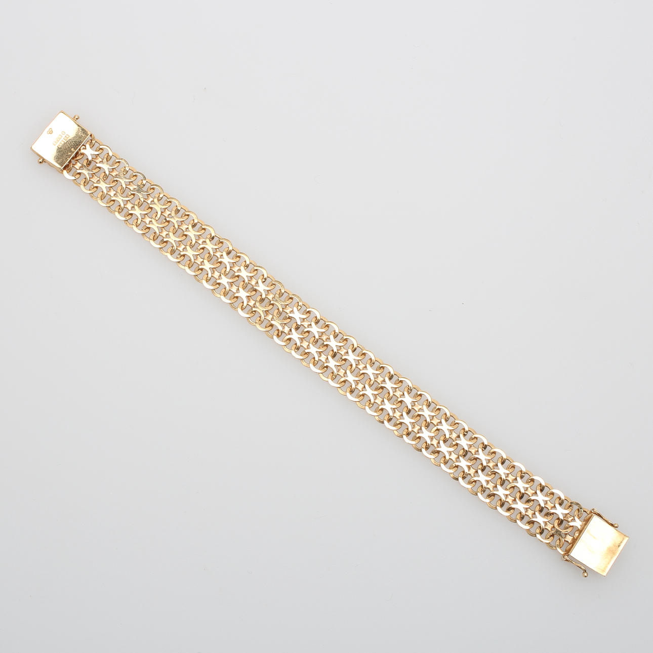 ARMBAND, x-länk, guld 18 K, vikt 23,1 g.