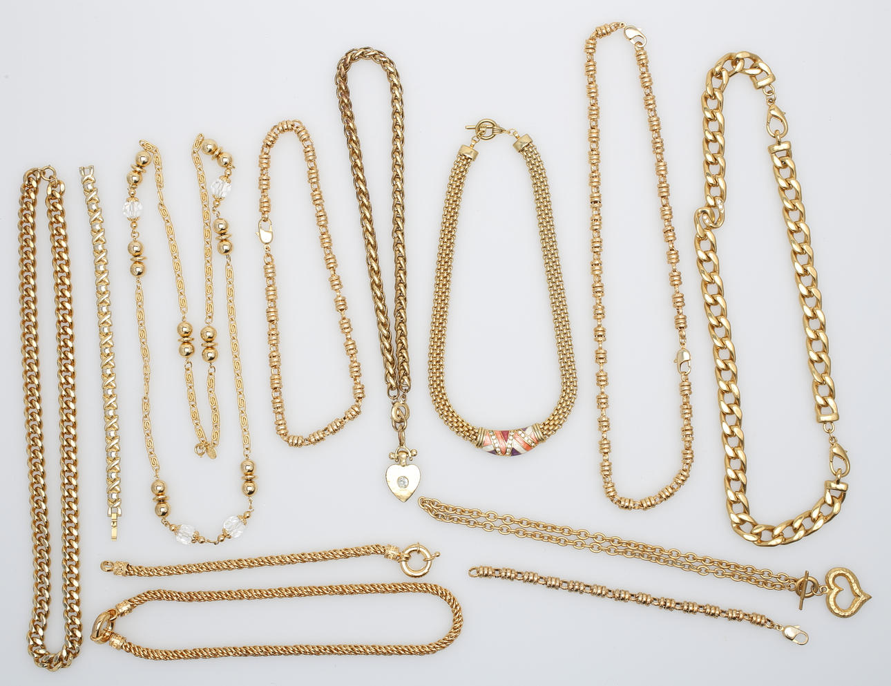 SMYCKEN, 12 delar, gulmetall.