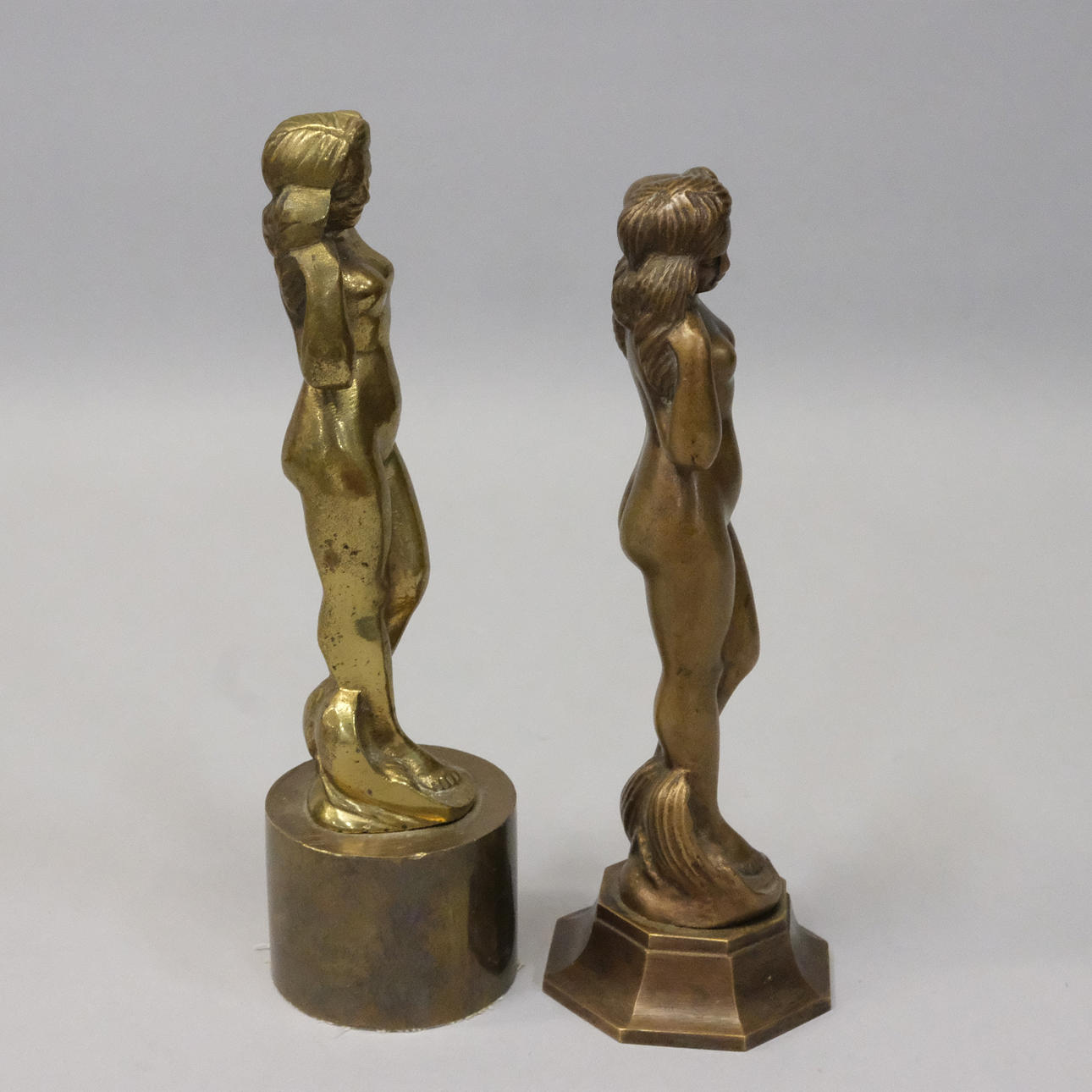 STATUETTES, A PAIR. Silver & Metals - Pewter, Brass & Copper - Auctionet