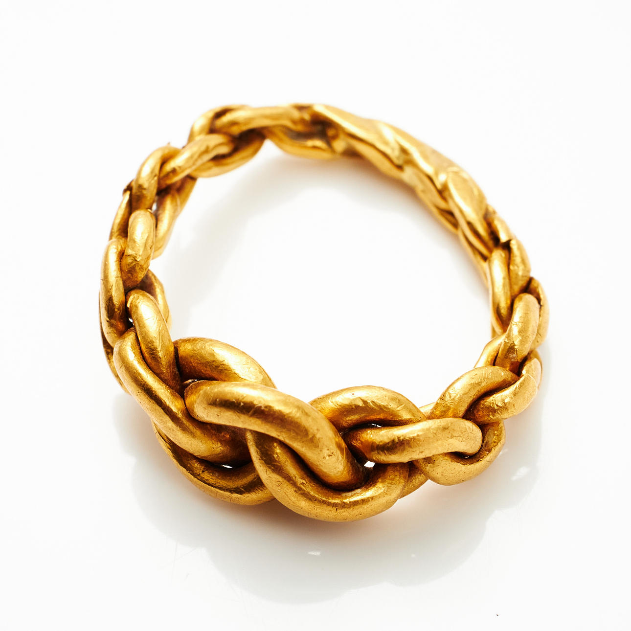 RING, 23 k guld, flätad, ostämplad.