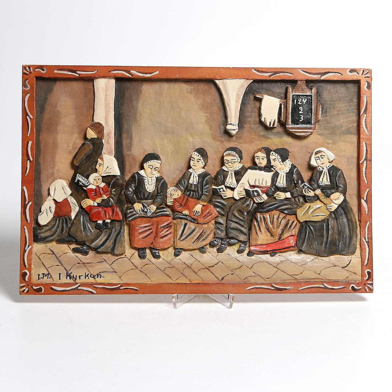 IDA MALM. Relief i trä "I kyrkan". Signerad.