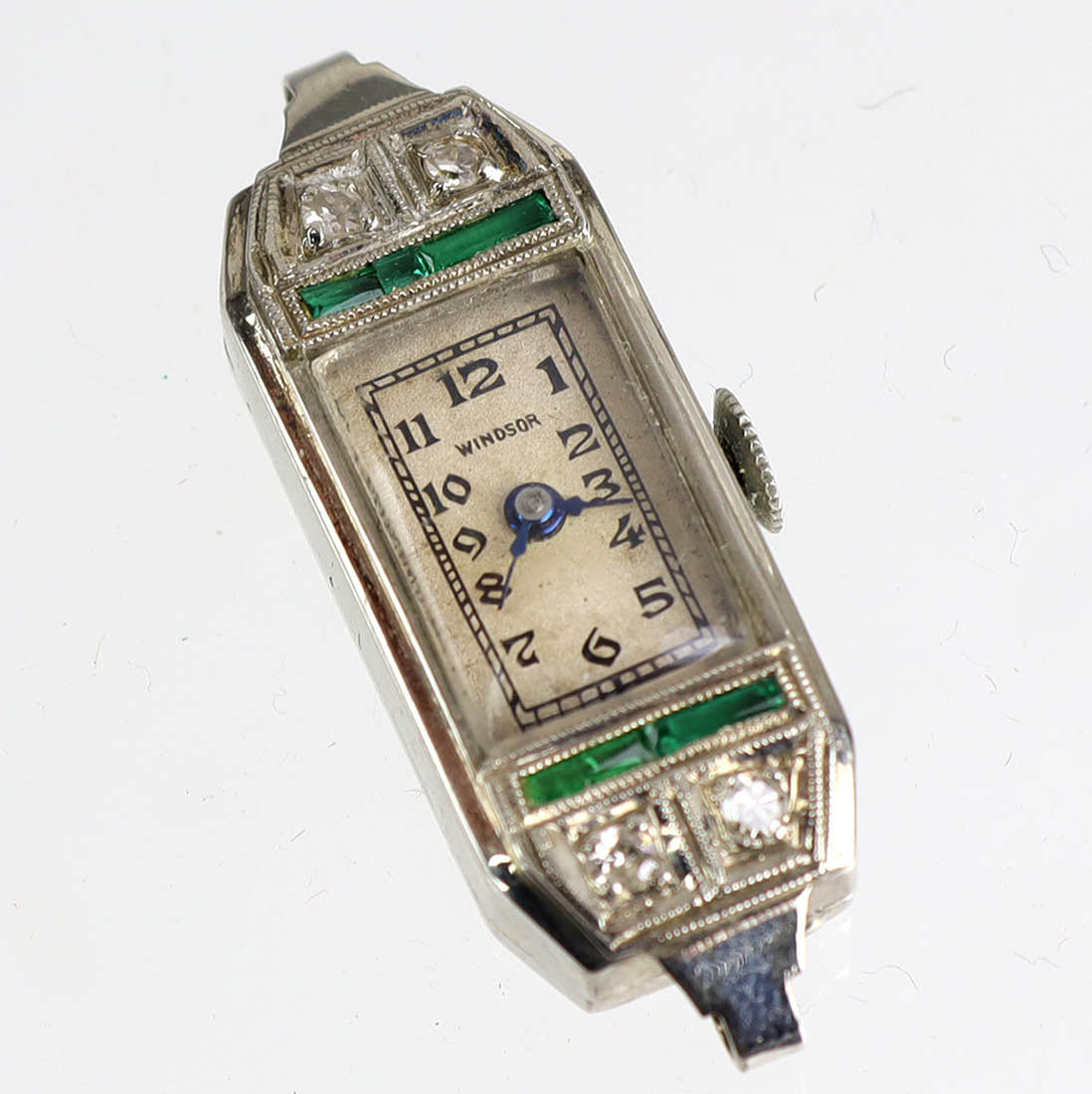 Diamant smaragd damklocka, platina.