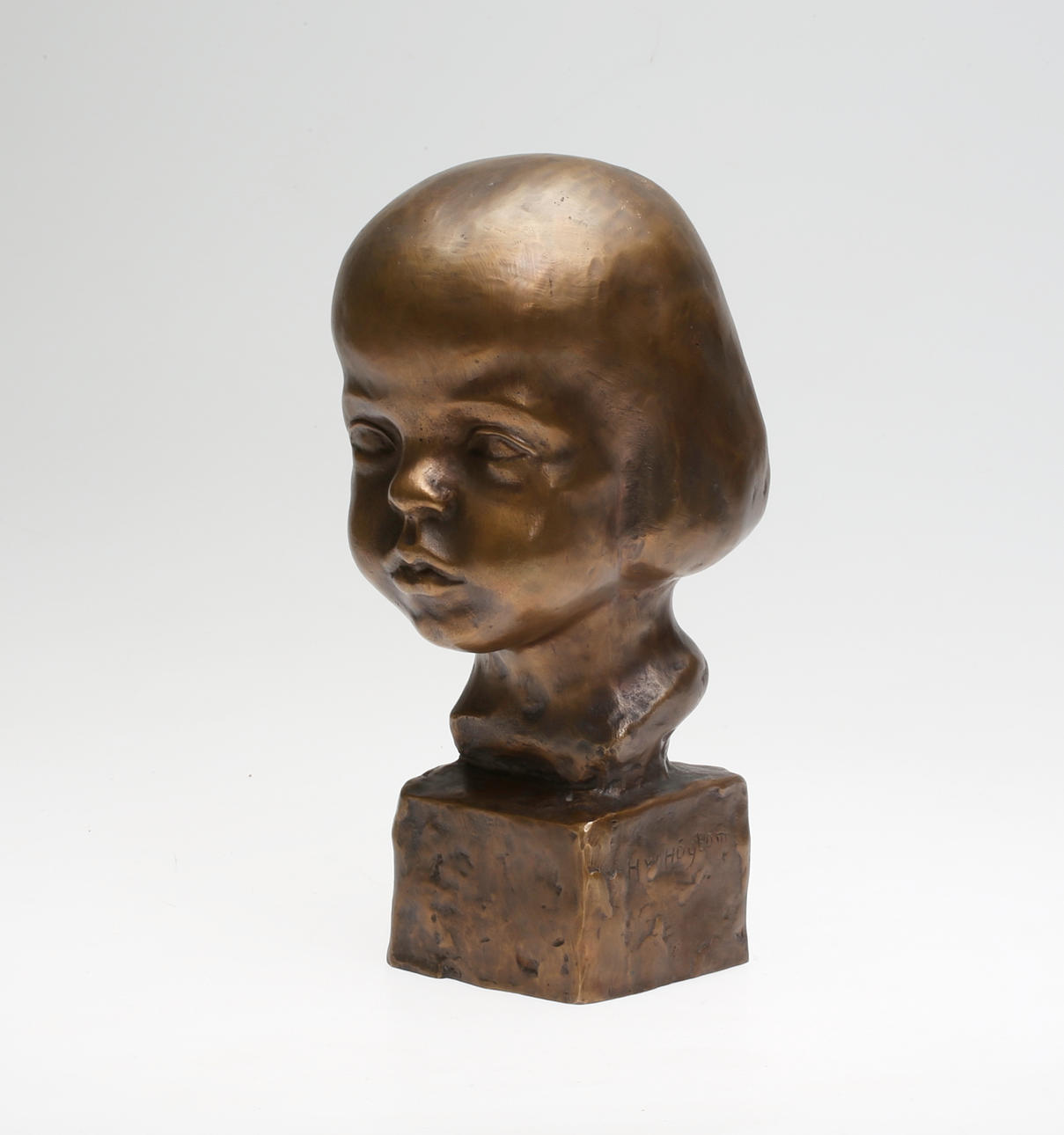 HELGE HÖGBOM. "Till Gulli", skulptur, brons, signerad HW Högbom.