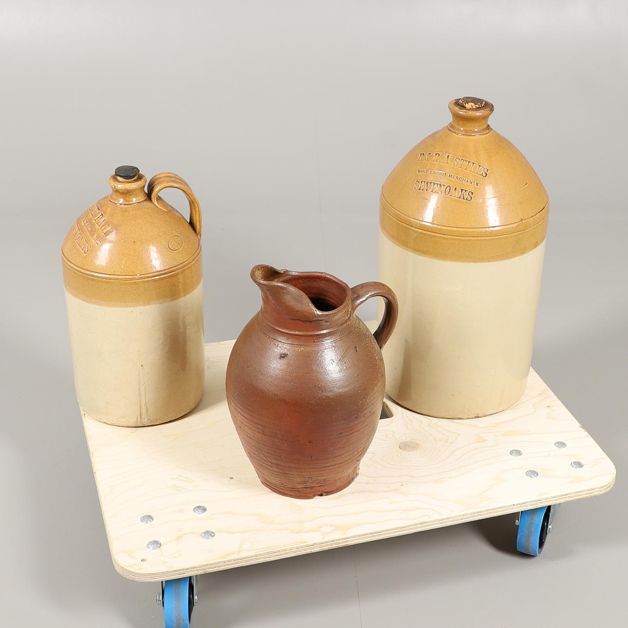 TWO LARGE STONEWARE WINE FLAGONS.