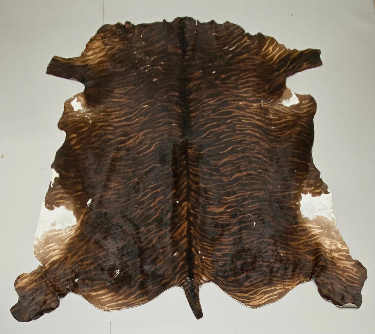 ALFOMBRA DE PIEL DE TORO NORMANDO.