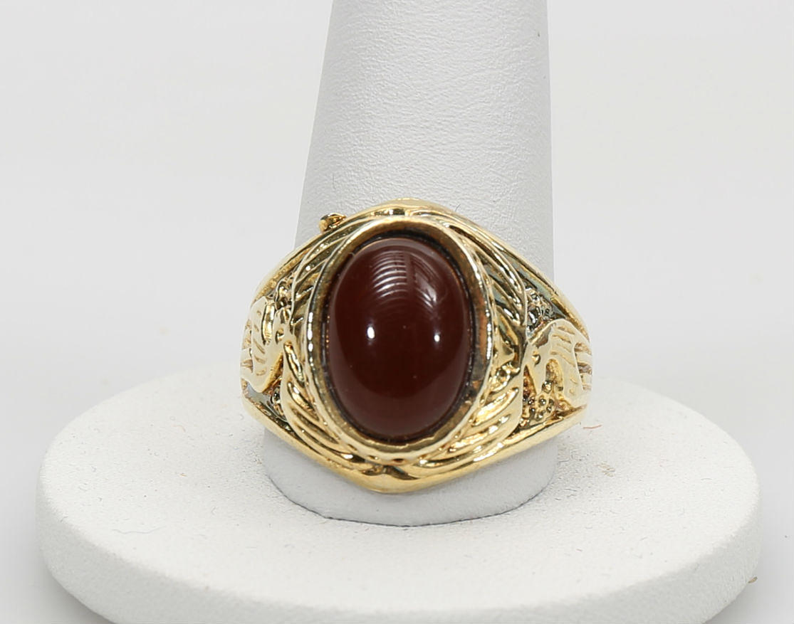 RING, förgylld, brunt dekorelement.