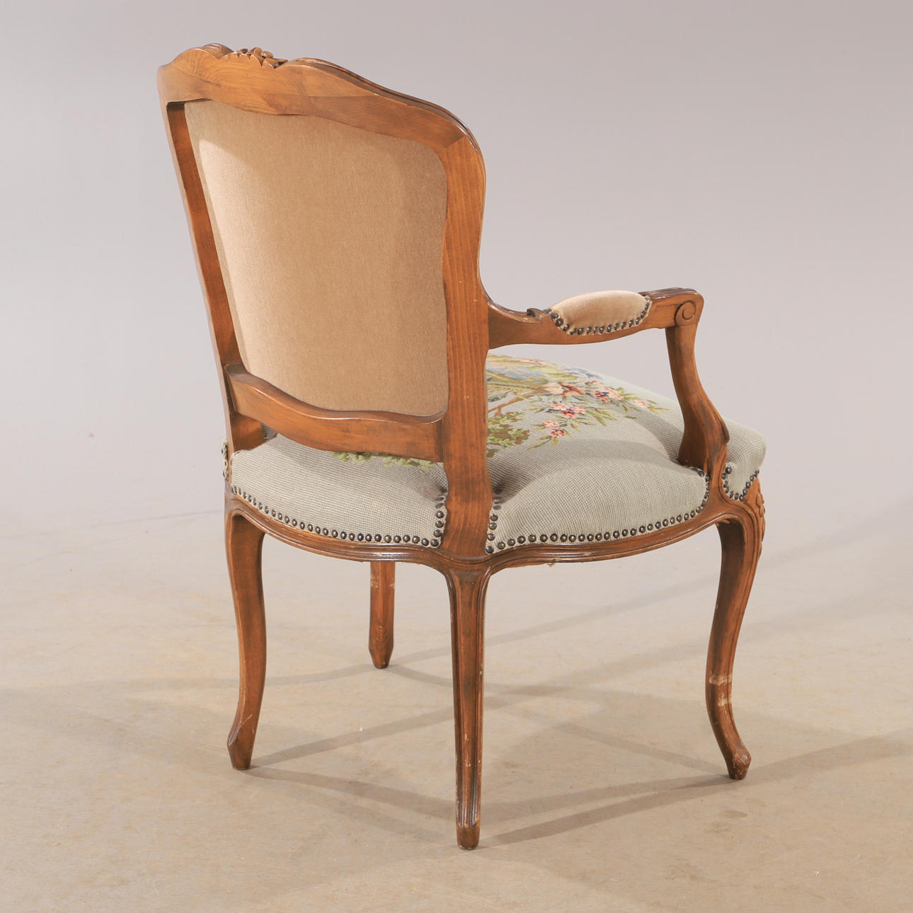 ARMCHAIR, walnut with embroidered upholstery, rococo style. Furniture ...