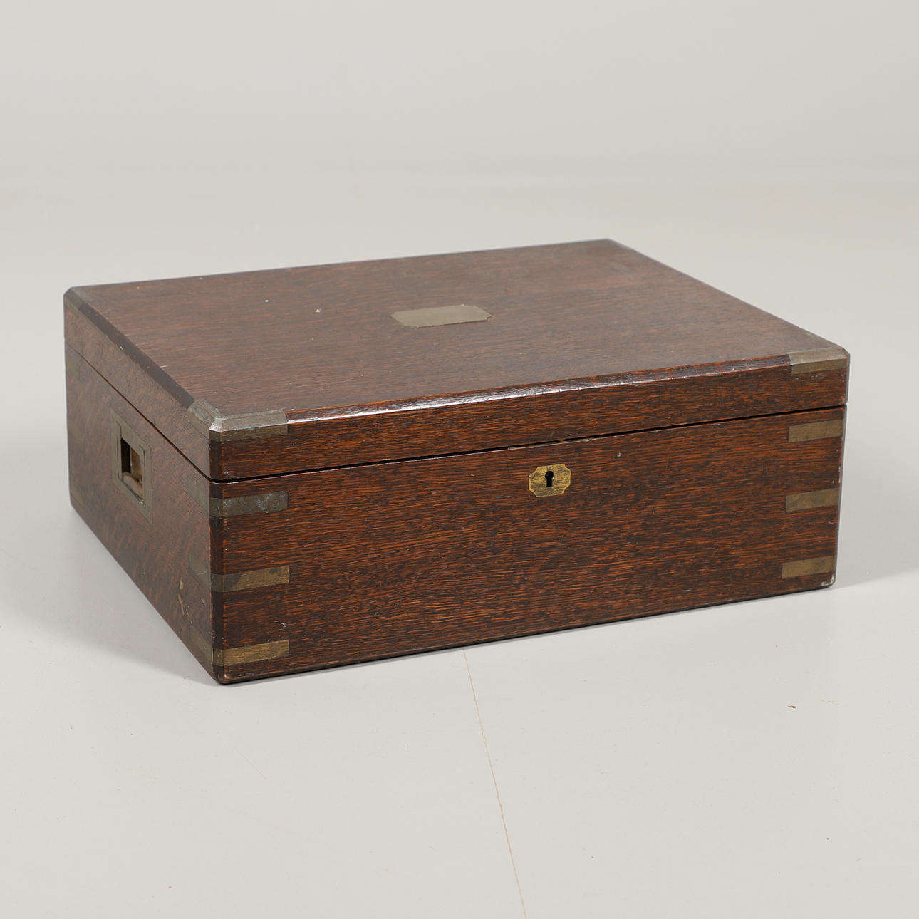 AN OAK CANTEEN BOX.