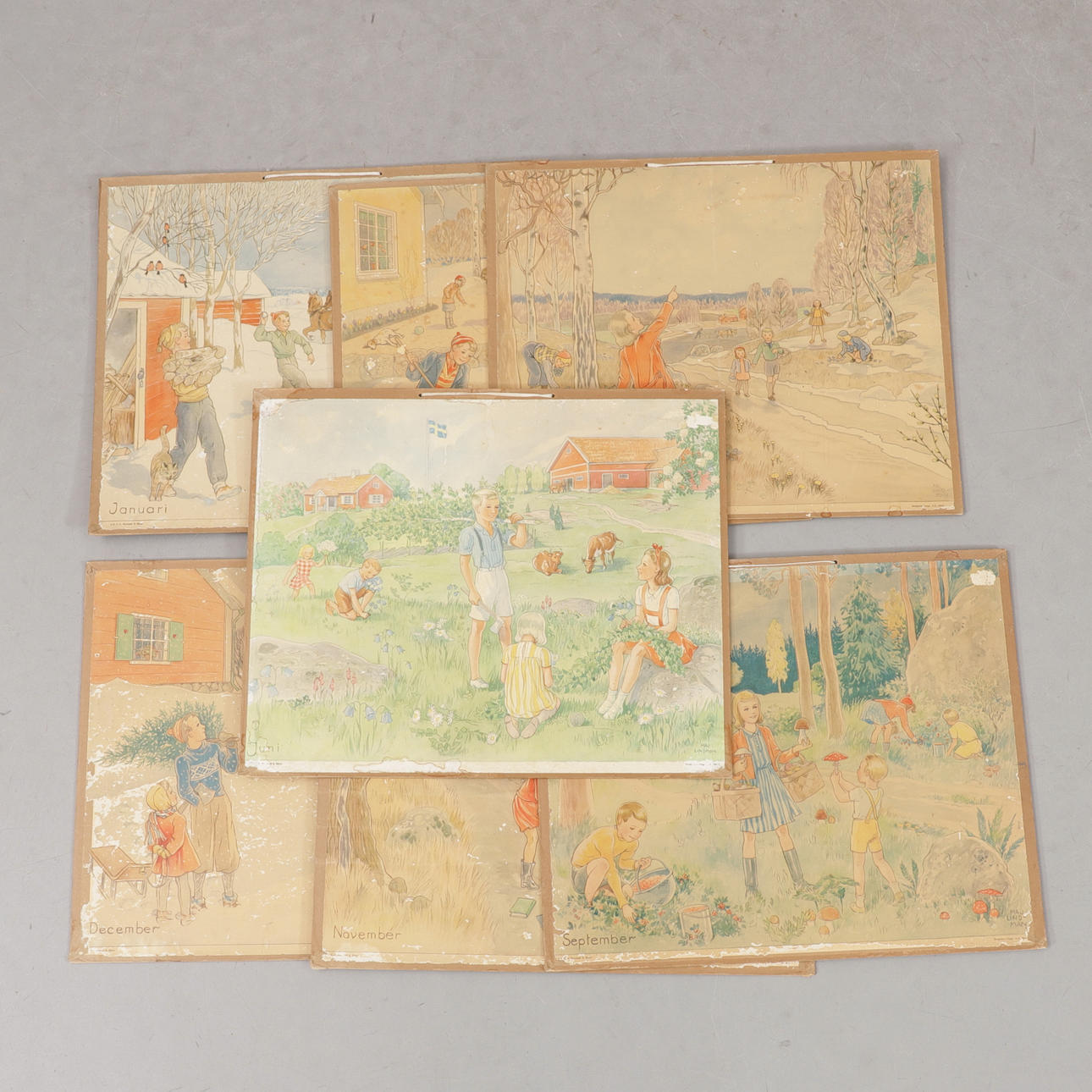 MAJ LINDMAN. Månadstavlor, 7 st, 1940-tal.