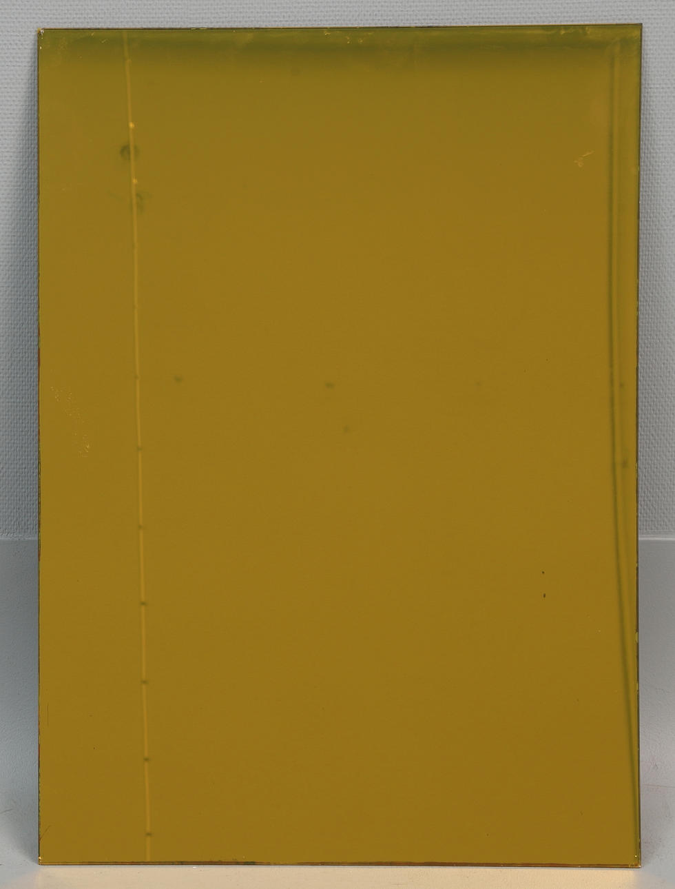 MIRROR, yellow tinted glass.