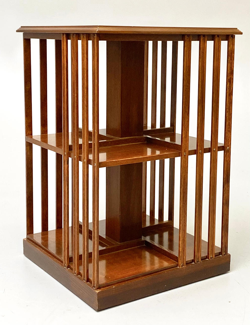 MUEBLE "REVOLVING" EN MADERAS CONTRASTADAS.