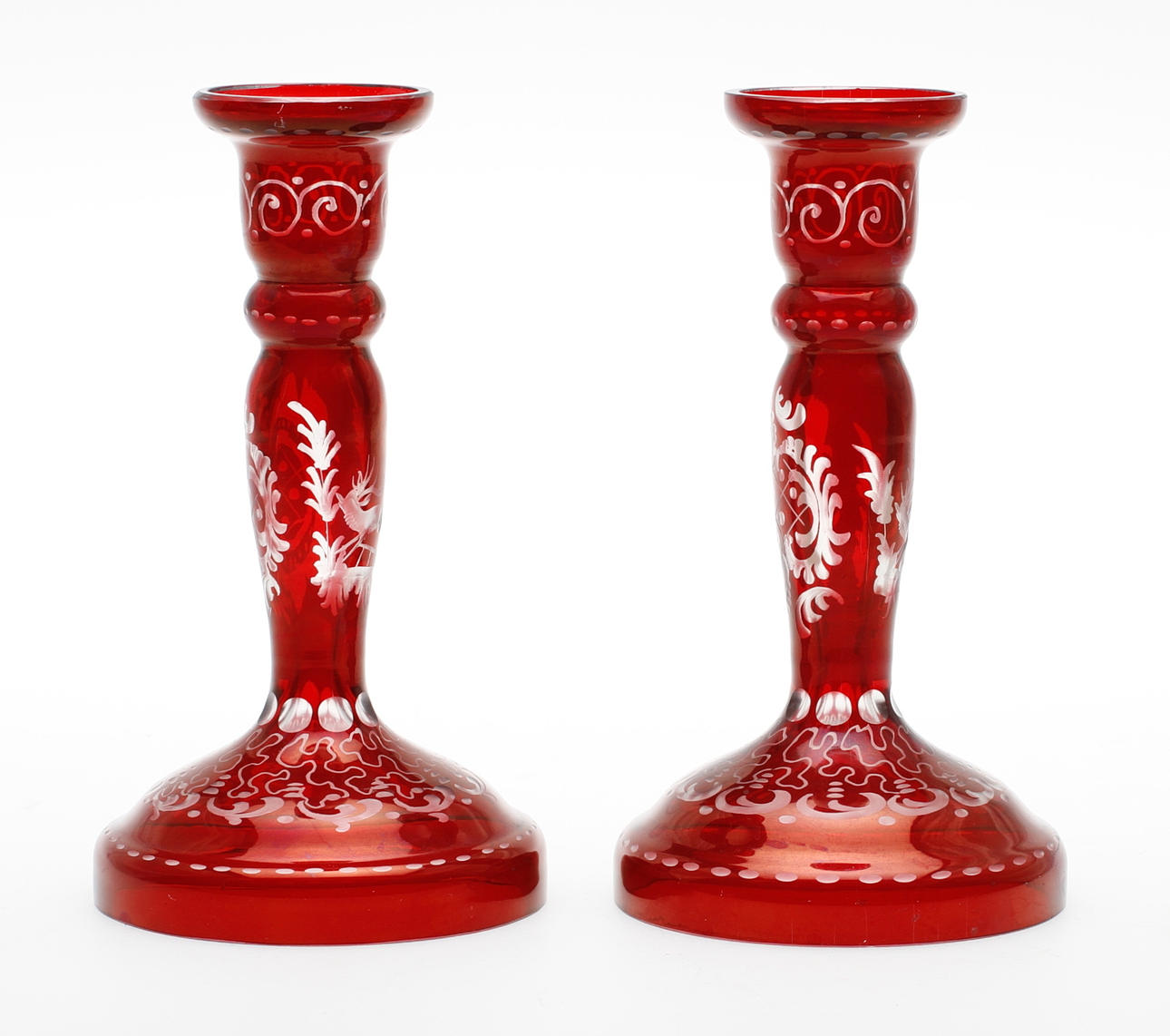 LJUSSTAKAR, ett par, glas, sannolikt Reijmyre, 1900-tal.