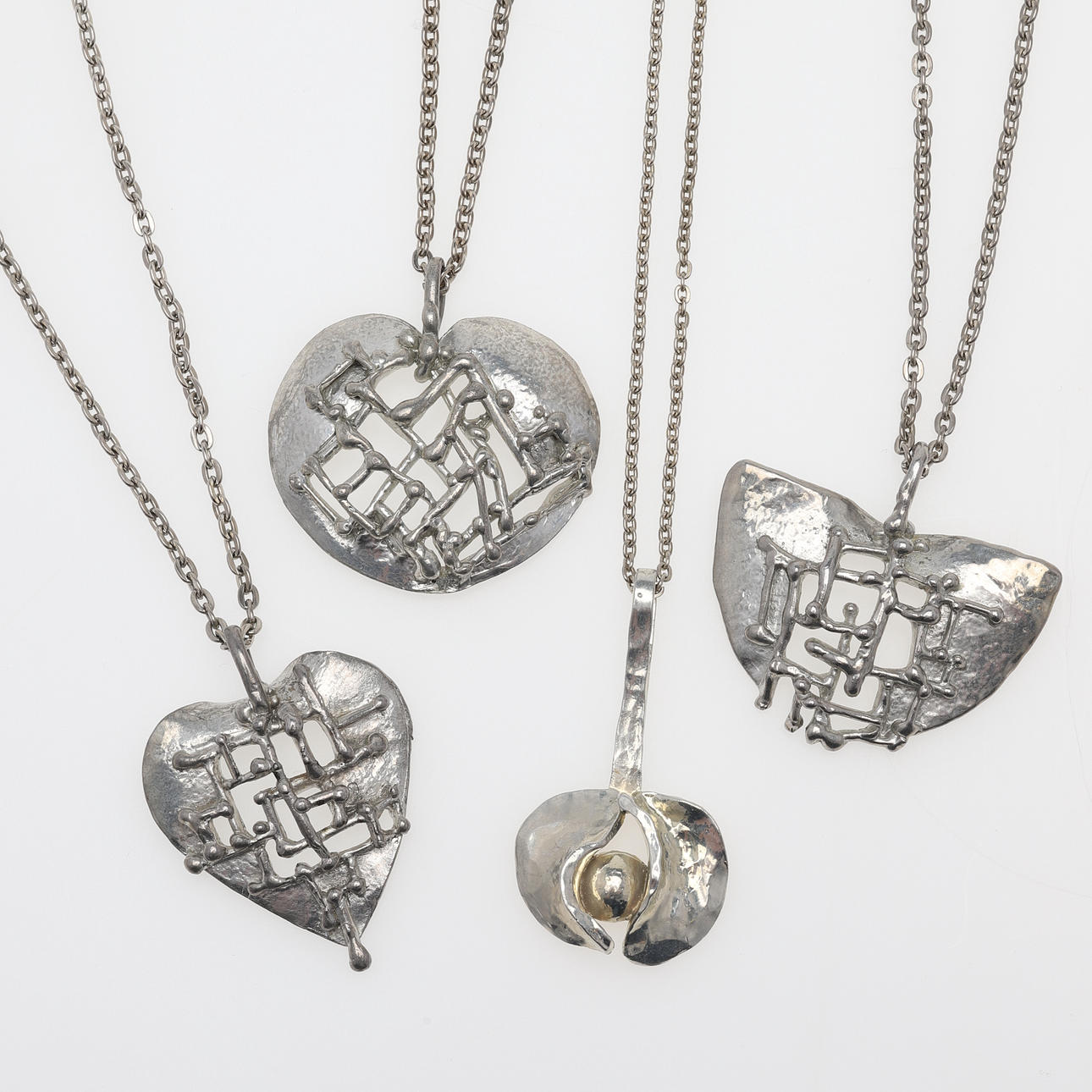 ETSUKO MINOWA. pendants with chains, 4 pcs, pewter.