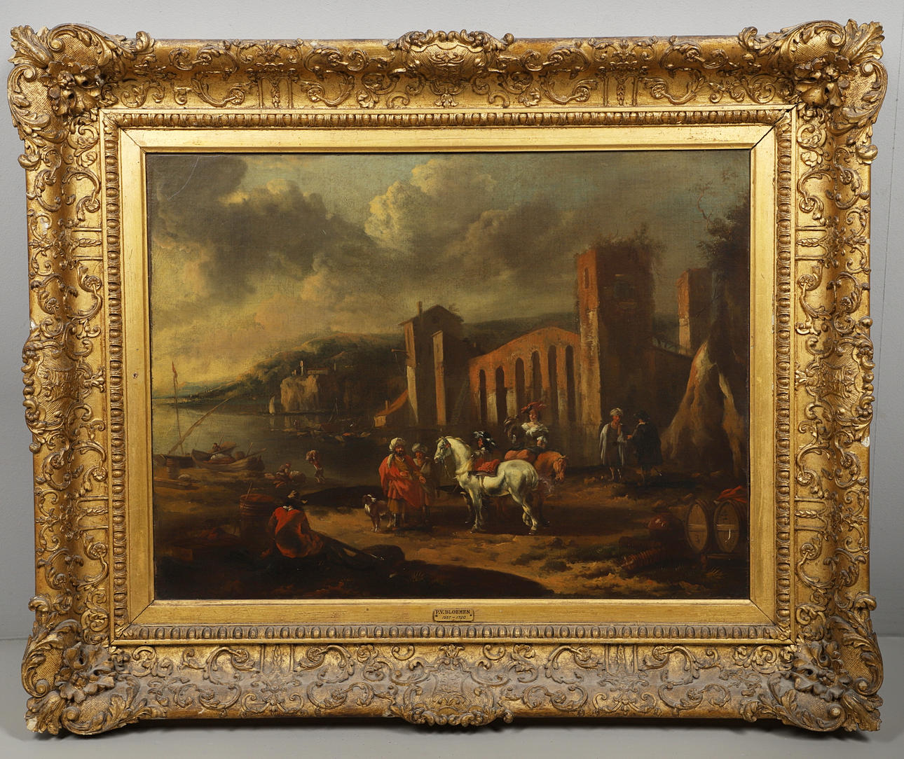 FOLLOWER OF PIETER VAN BLOEMEN (1657-1720). MERCHANTS AND OTHER FIGURES WITH HORSES, BY RUINS IN AN ITALIANATE COASTAL LANDSCAPE.