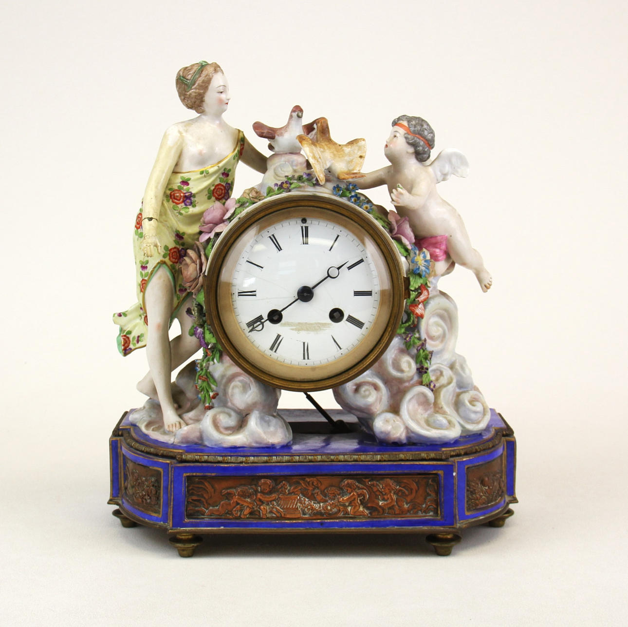 PAINTED COPPER AND BRONZE CLOCK.