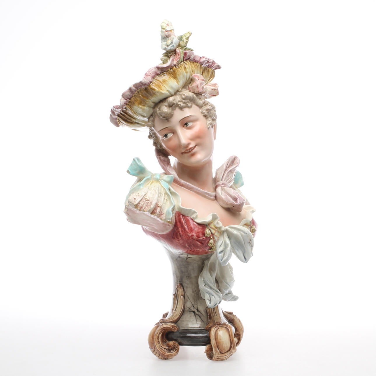 BYST, keramik. Kvinna med hatt, 1900-tal.